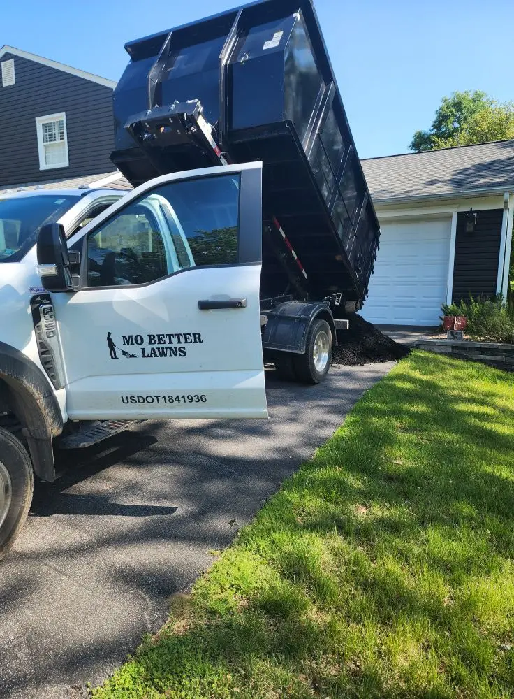 dumpster truck deliver