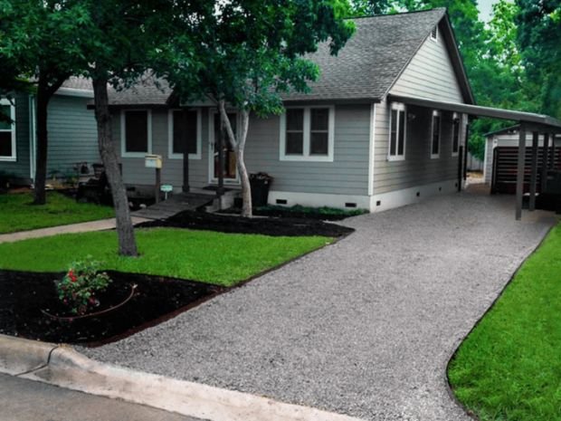 residential driveway with new gravel installed